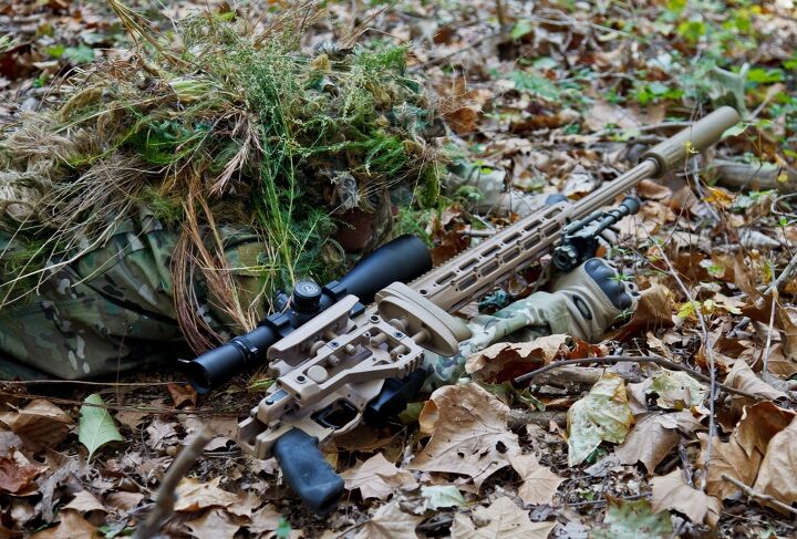 Военное оружие. Снайперка надпись. Sniper 2010. Фото опасных снайперских оружий.