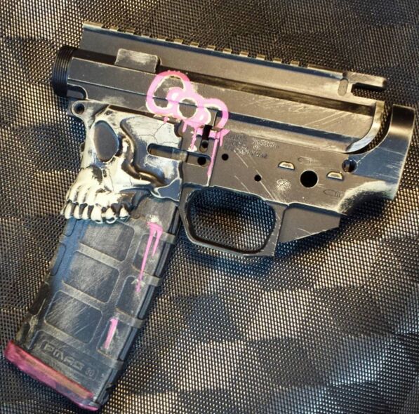 Custom painted firearms by Bad Ass Paint