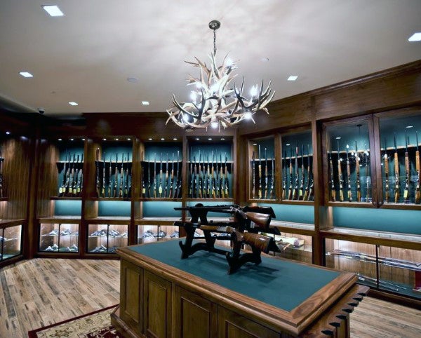 gun-display-room-design-with-wooden-cabinetry